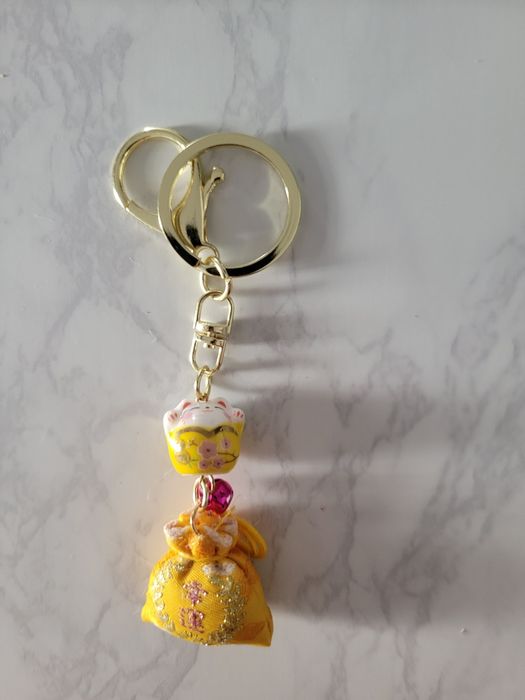 Porta chaves dourado