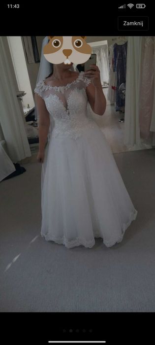 Śmietankowa suknia ślubna