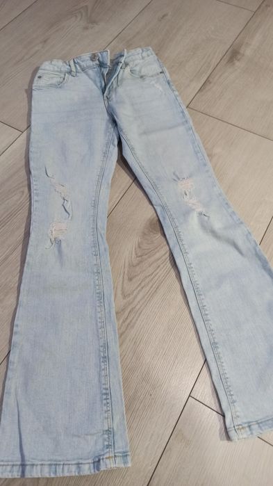 Spodnie jeansy 40 zł para 152