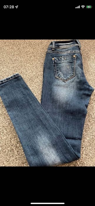 Spodnie z przetarciami