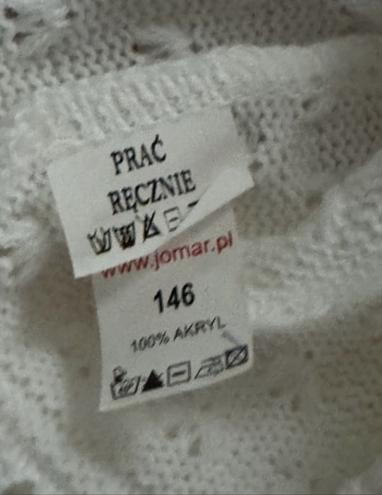 Biały elegancki sweterek