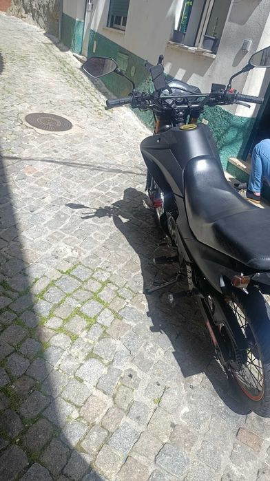 Troco keeway tx 125 tudo ok por trotinete elétric
