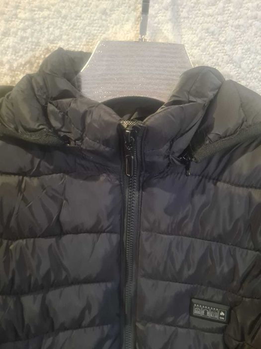 Casaco de aquecimento recarregável