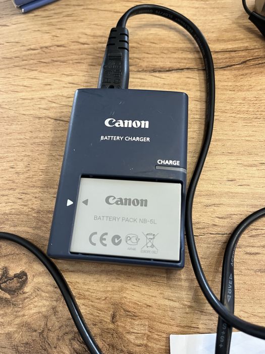 Цифровий фотоапарат бренду Canon, модель SX 210IS.