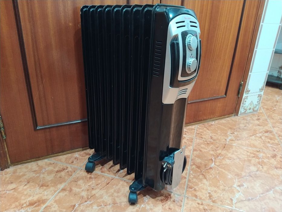 Aquecedor radiador a óleo casa quarto apartamento vivenda escritório gabinete cozinha.