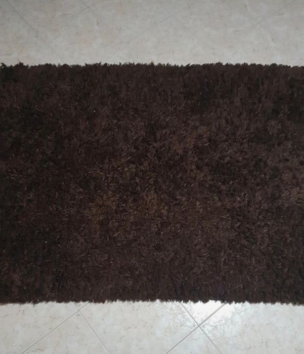 Brown rectangular carpet423322216700334083