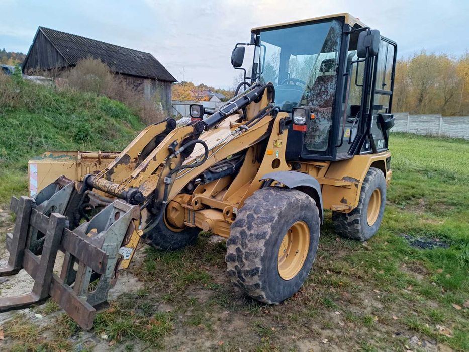 Фронтальний навантажувач CAT 906