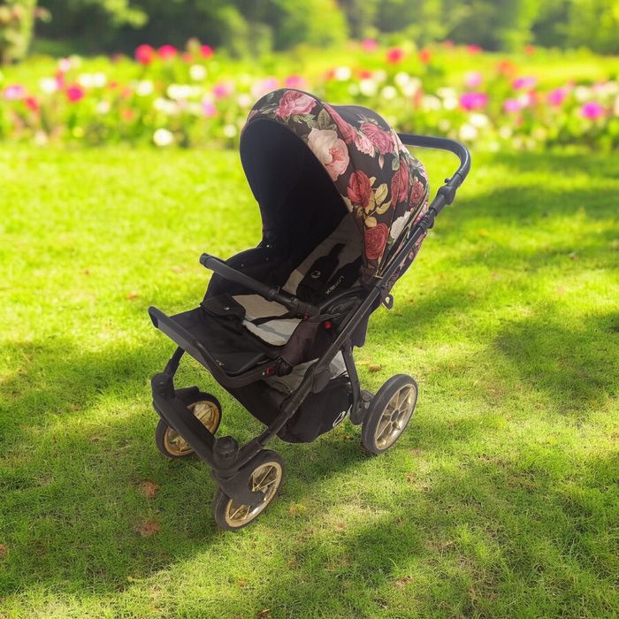 Sprzedam spacerówkę w kwiaty dla dziewczynki!