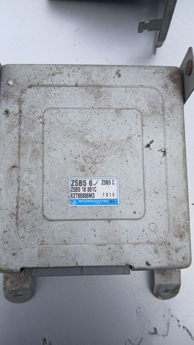 Трамблёр мозги блок  управления мазда 323  БА MAZDA BA