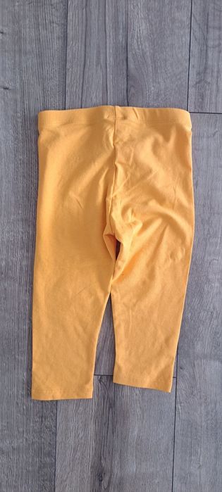 Leginsy 3/4 pomarańczowe r.110