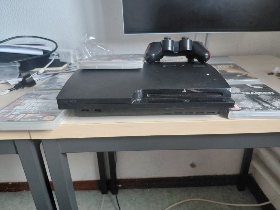 ps3 slim com vairos jogos