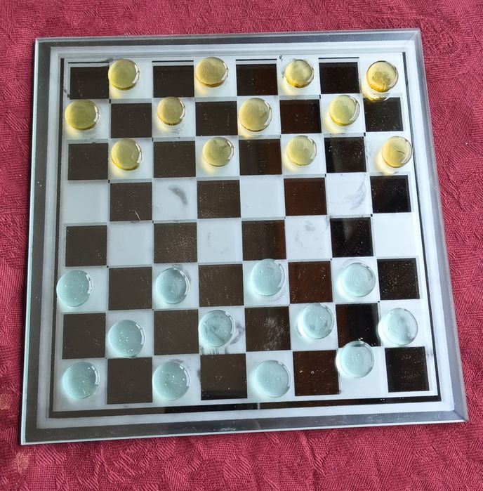 Jogo de xadrez e damas de vidro