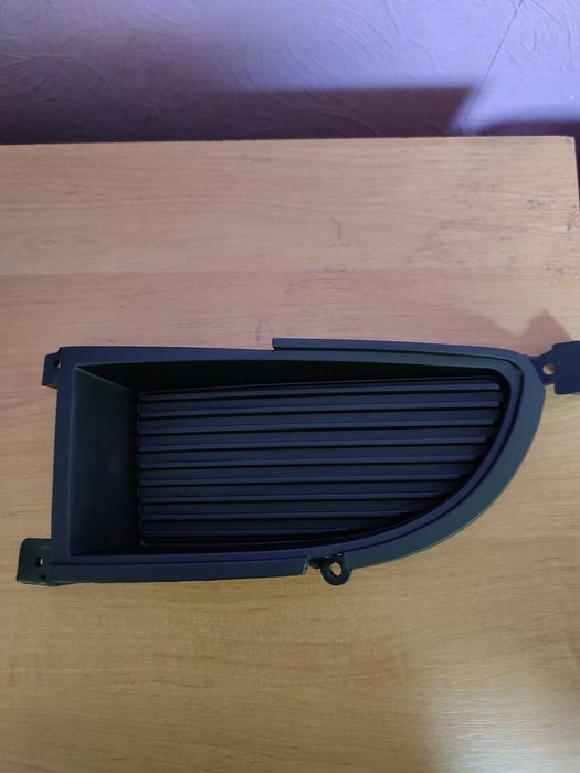 Решітка бампера Mitsubishi Lancer (ліва)