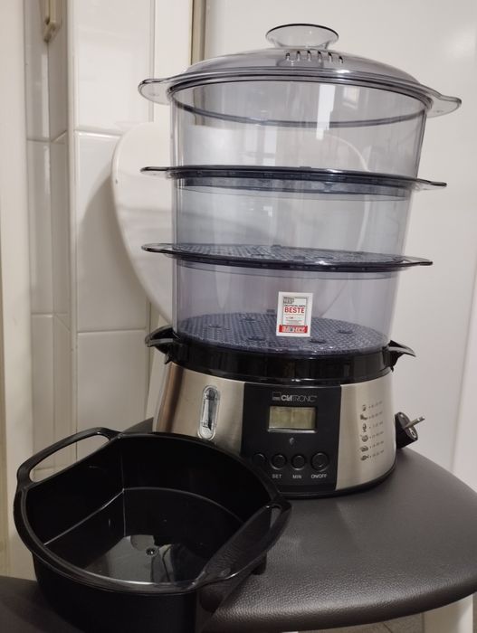 Panela de cozer a vapor em estado perfeito