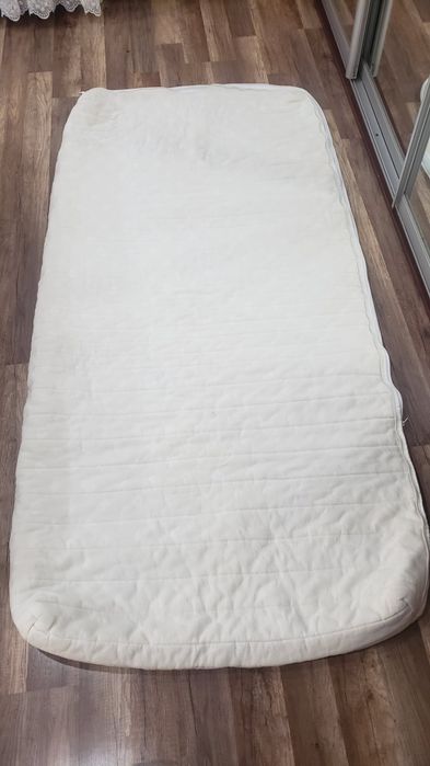 Наматрасник на дитяче ліжечко
