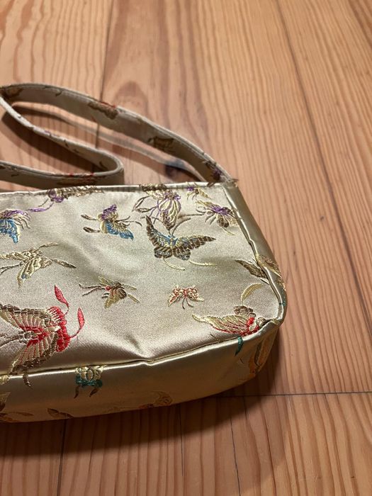 Bolsa pequena com figuras