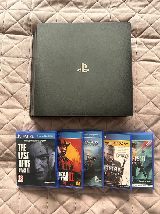 PlayStation 4 Pro + 5 ігор в комплекті
