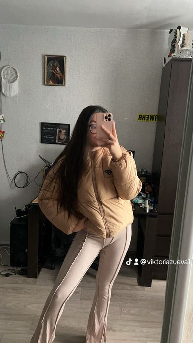 Пуховик новий