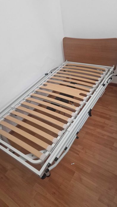 Cama articulada semi eléctrica com grades
