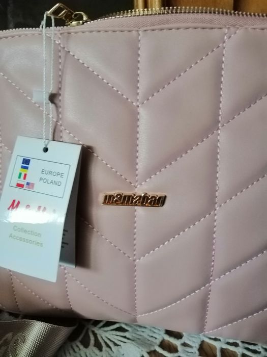 Listonoszka pudrowy roż