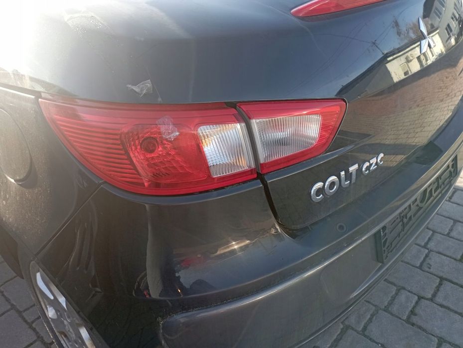 MITSUBISHI COLT VI CZC CABRIO LAMPA LEWA TYŁ TYLNA W BŁOTNIK