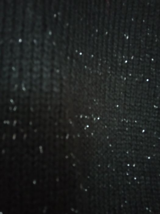 Casaco preto sem mangas