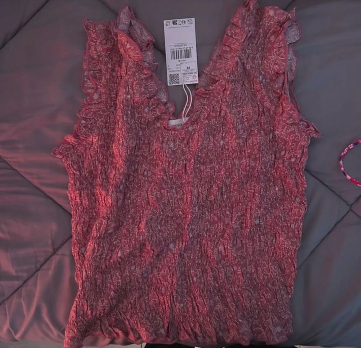 top com costas abertas