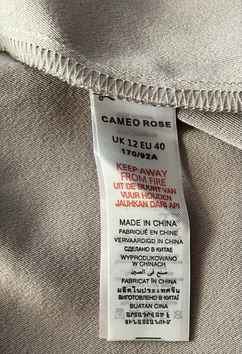 Krótki beżowy kombinezon damski New Look L