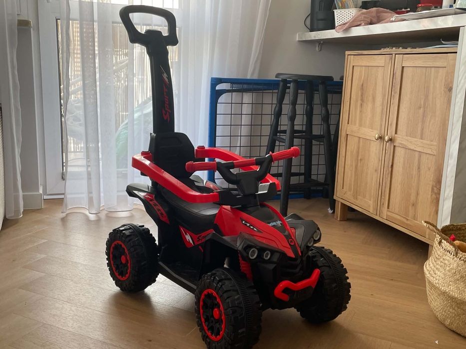 Jeździk z rączka dziecięcy jak nowy
