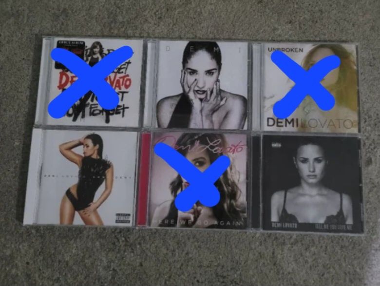 Três cds Demi Lovato