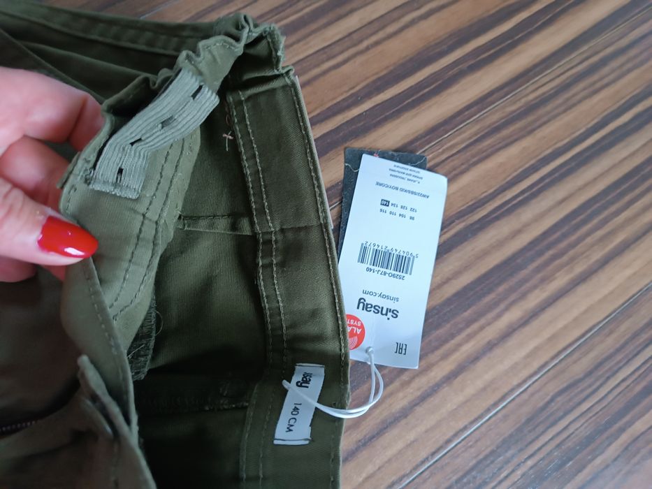 Nowe spodnie slim eleganckie i cienkie 140 Sinsay