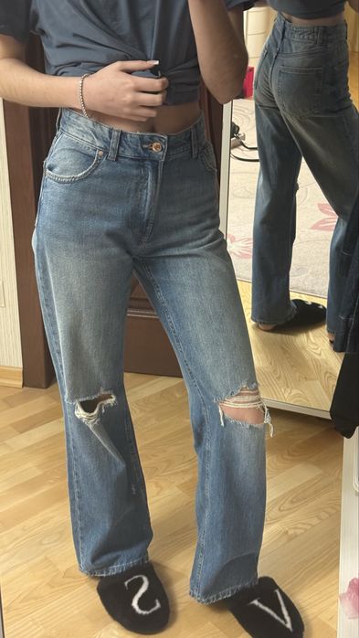 джинси з дірками bershka