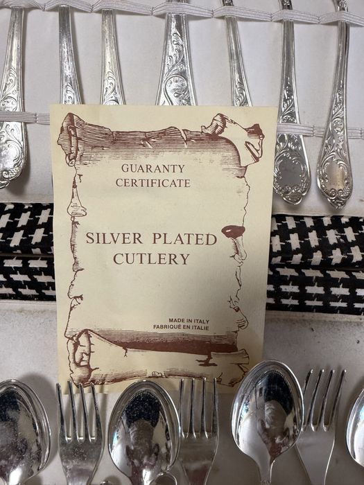 Conjunto de talheres de prata com certificado