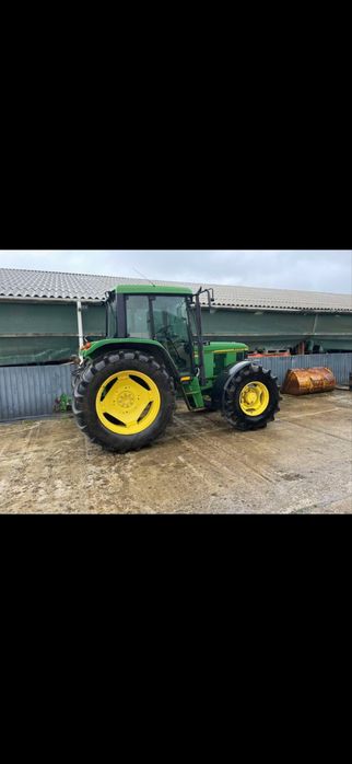 Трактор John Deere 6400