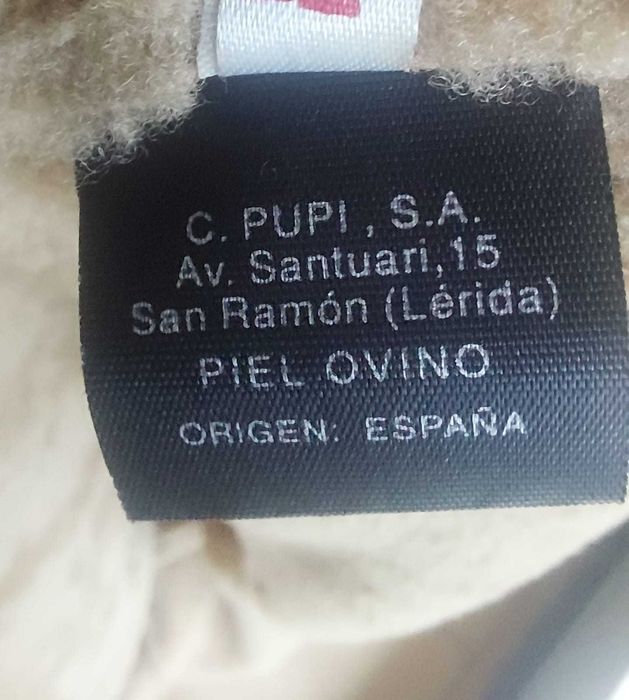 Casaco de homem em pele de ovelha