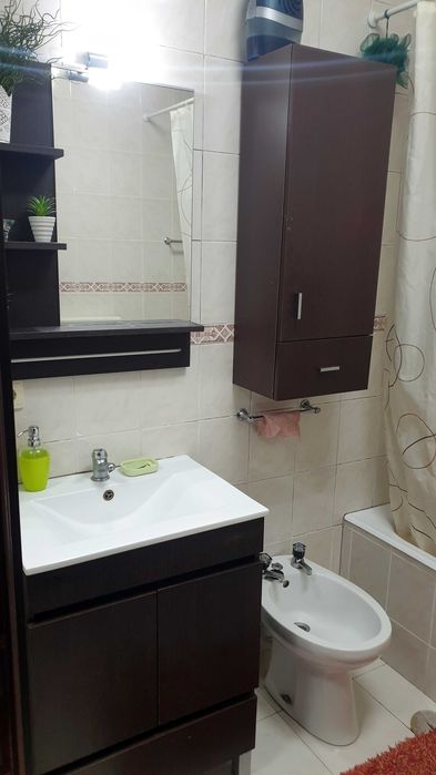 Quarto com varanda e TV