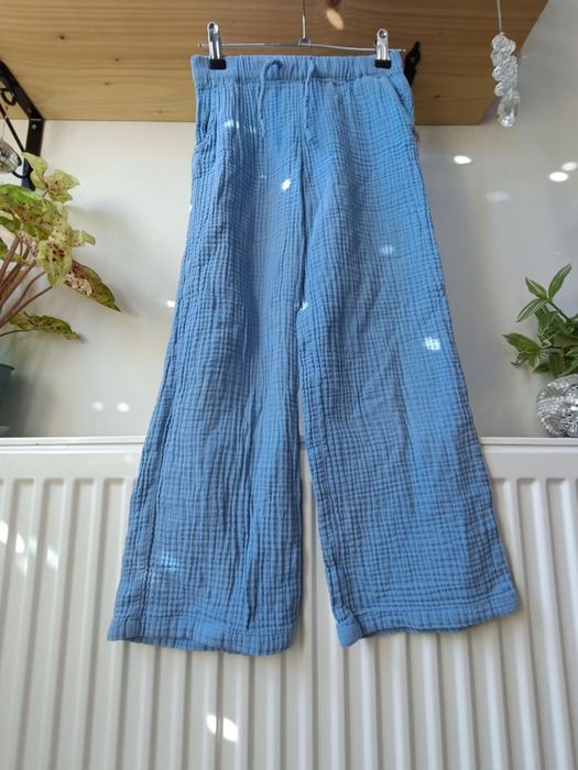 Spodnie luźne muślinowe letnia szerokie dzwony 134