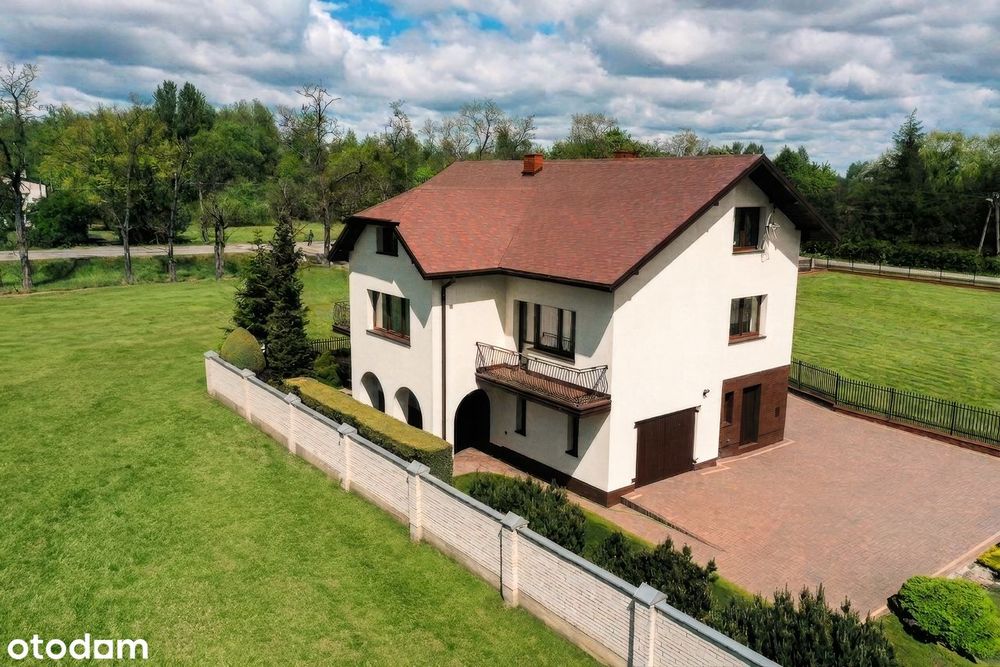 Przestronny dom z dużą działką i budynkiem gospodarczym — Kuznocin - Widok 2