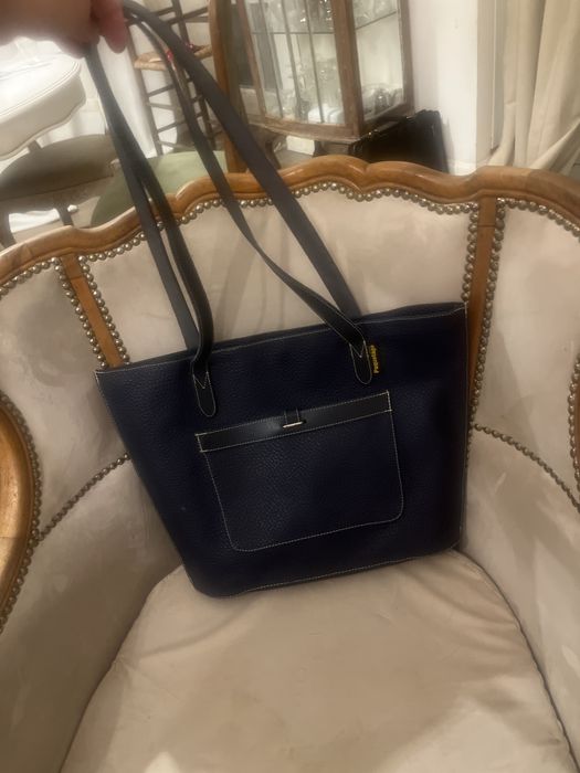 Francuska torebka w atrakcyjnym ksztalcie