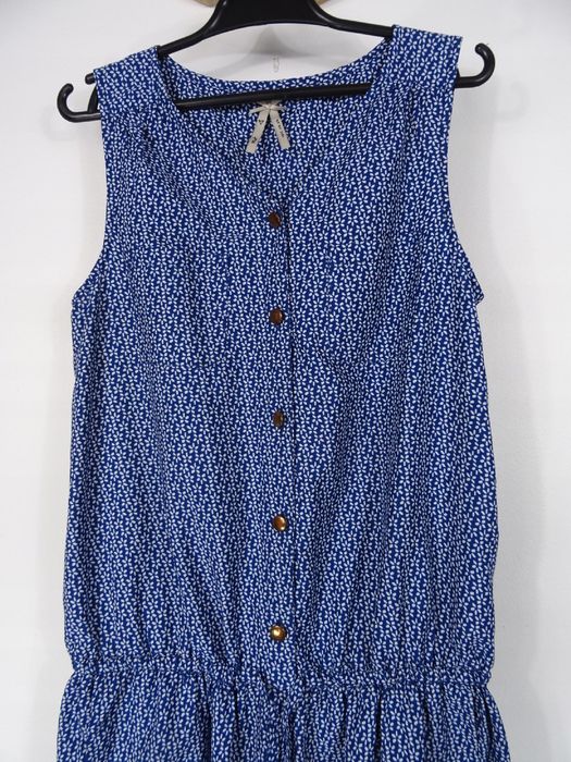 Kombinezon długi Next 134 9 lat