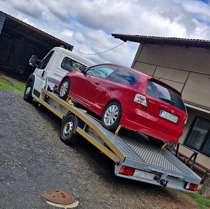 Laweta Pomoc Drogowa Transport Dowóz Paliwa Autolaweta Holowanie