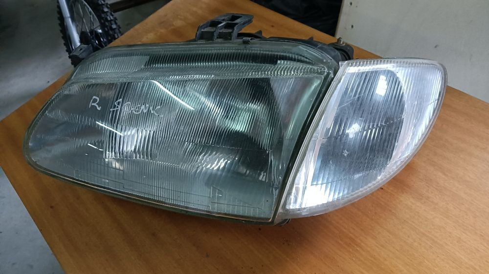 Ótica Renault Scenic farol esq. Óptica 1998