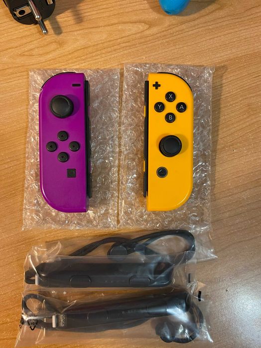 Nintendo Switch V2 - 32GB - Purple and Orange JoyCons, Dock, Cabos, Controller