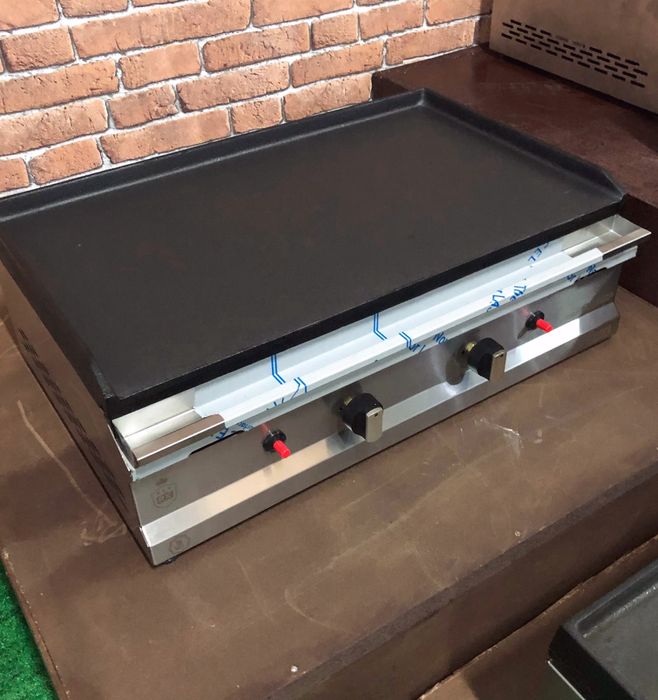 Placa de grelhar de ferro elétricas e a gás