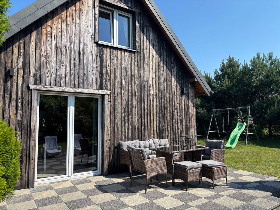 Domek z kominkiem nad morzem z sauną balia jacuzzi Słajszewo