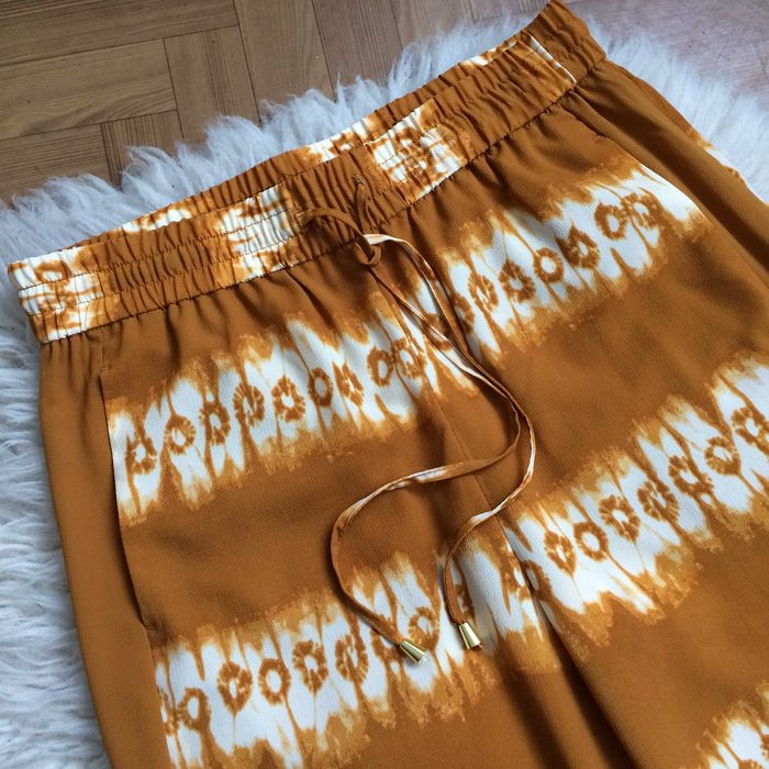 H&M spodnie palazzo musztardowe miodowe tie dye letnie boho L 40