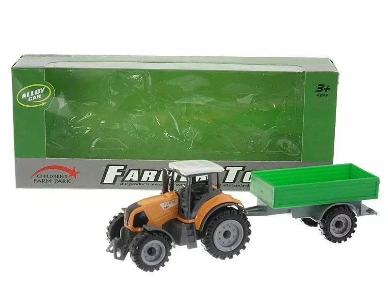 Traktor z przyczepą metalowy. Adar