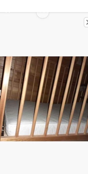 TANIO Łóżeczko dziecięce drewniane z materacem