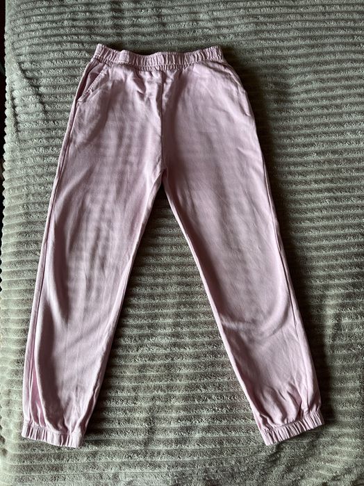 Spodnie lekko ocieplane dla dziewczynki jasnoróżowe, roz 128, Sinsay