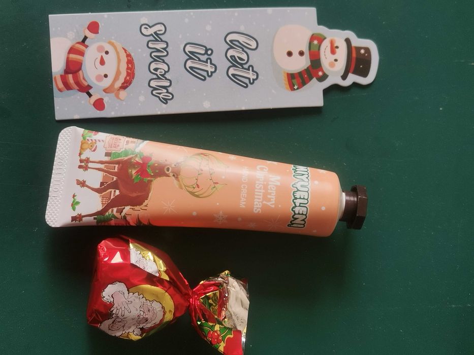 Creme de mãos, separador de livros
